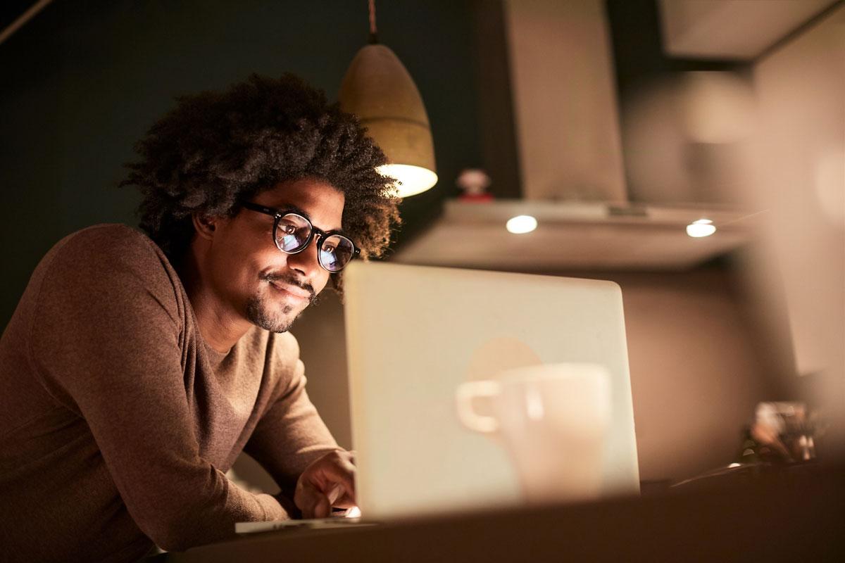 Man working on his finances on his laptop.